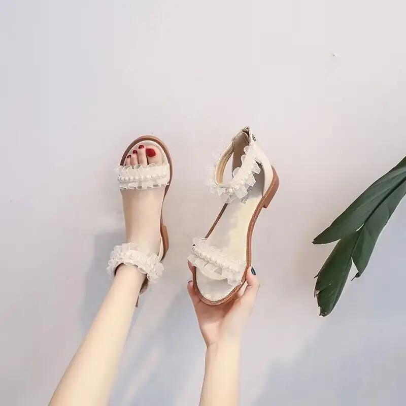 Мода Одно слово Римский стиль Молния Женская обувь Плоская резина Без каблука Жемчуг Уличная обувь Белый Открытый носок Летние 2024 Сандалии для женщин H