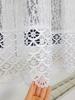 A fashionable jacquard curtain decorated with guipure lace