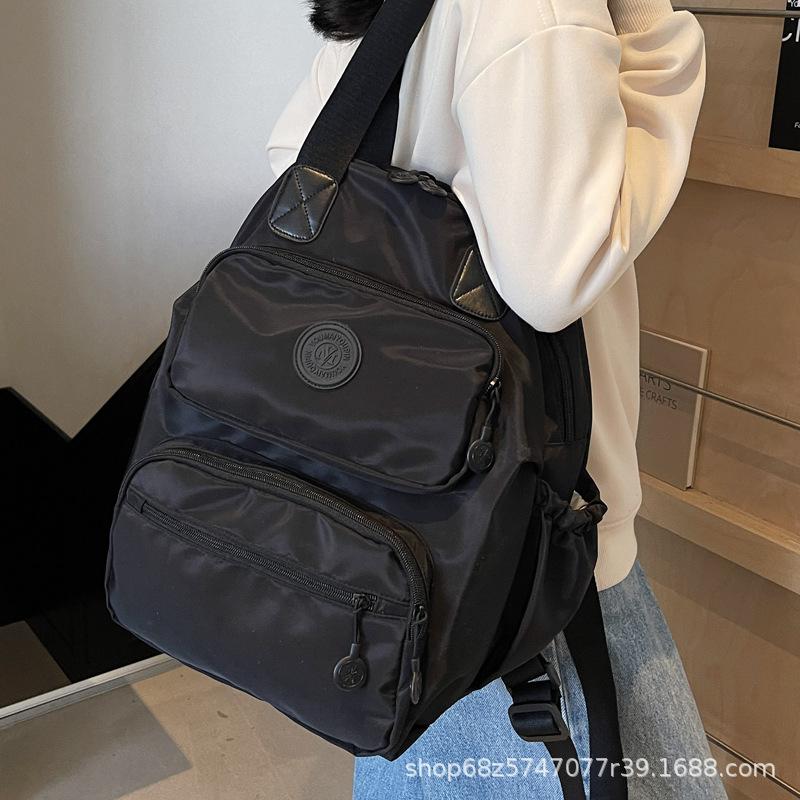 2025 New Large Capacity Casual Backpack Casual Travel School Bag Nylon Cloth Hiking Bag Lightweight Shoulder Bag