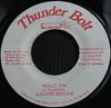 7-дюймовая пластинка SYLVANUS JUNIOR MOORE Hold On THB0382 Thunder Bolt Ямайка Регги Ска Даб Б/у