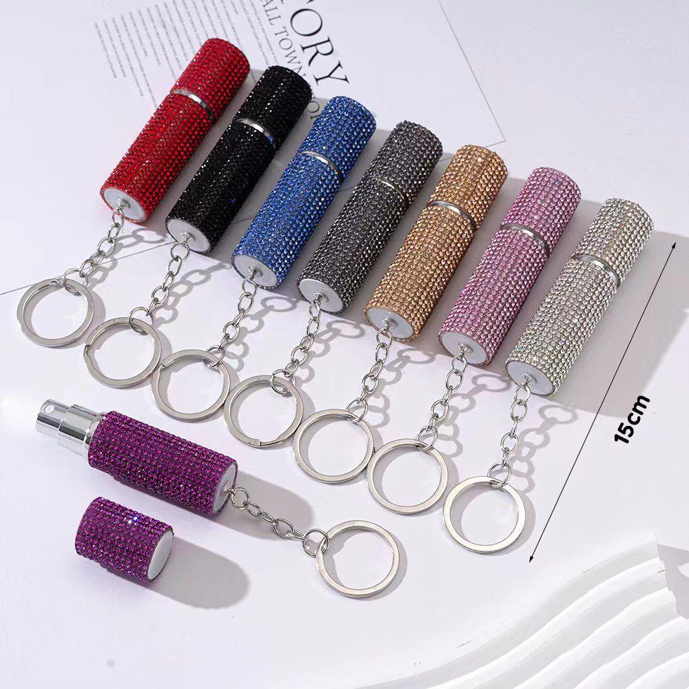 Portable Empty Perfume Bottle Mini Travel Sample New Keyring Spray