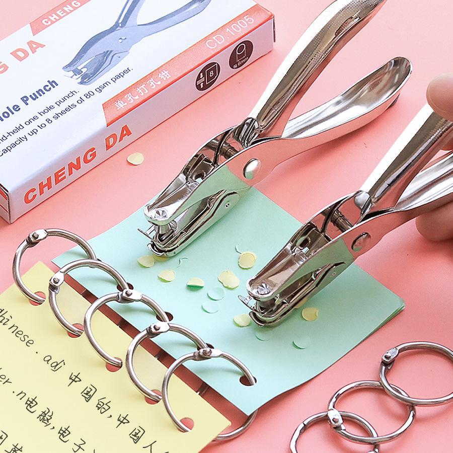 Дырокол с круглыми отверстиями для переплета картона и бумаги