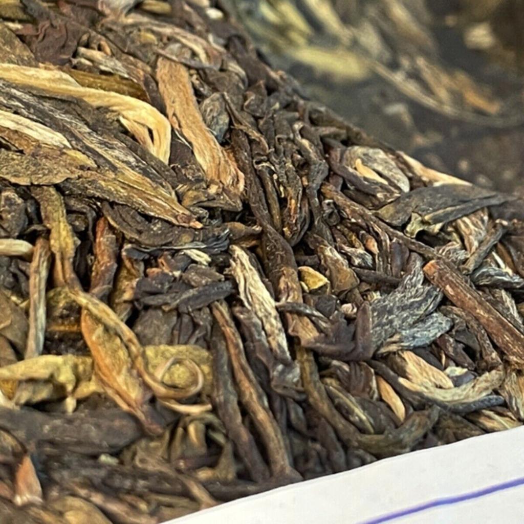 Юньнаньский фирменный чай Иу Ма Хэй Пуэр, сырой чайный брусок 357 г