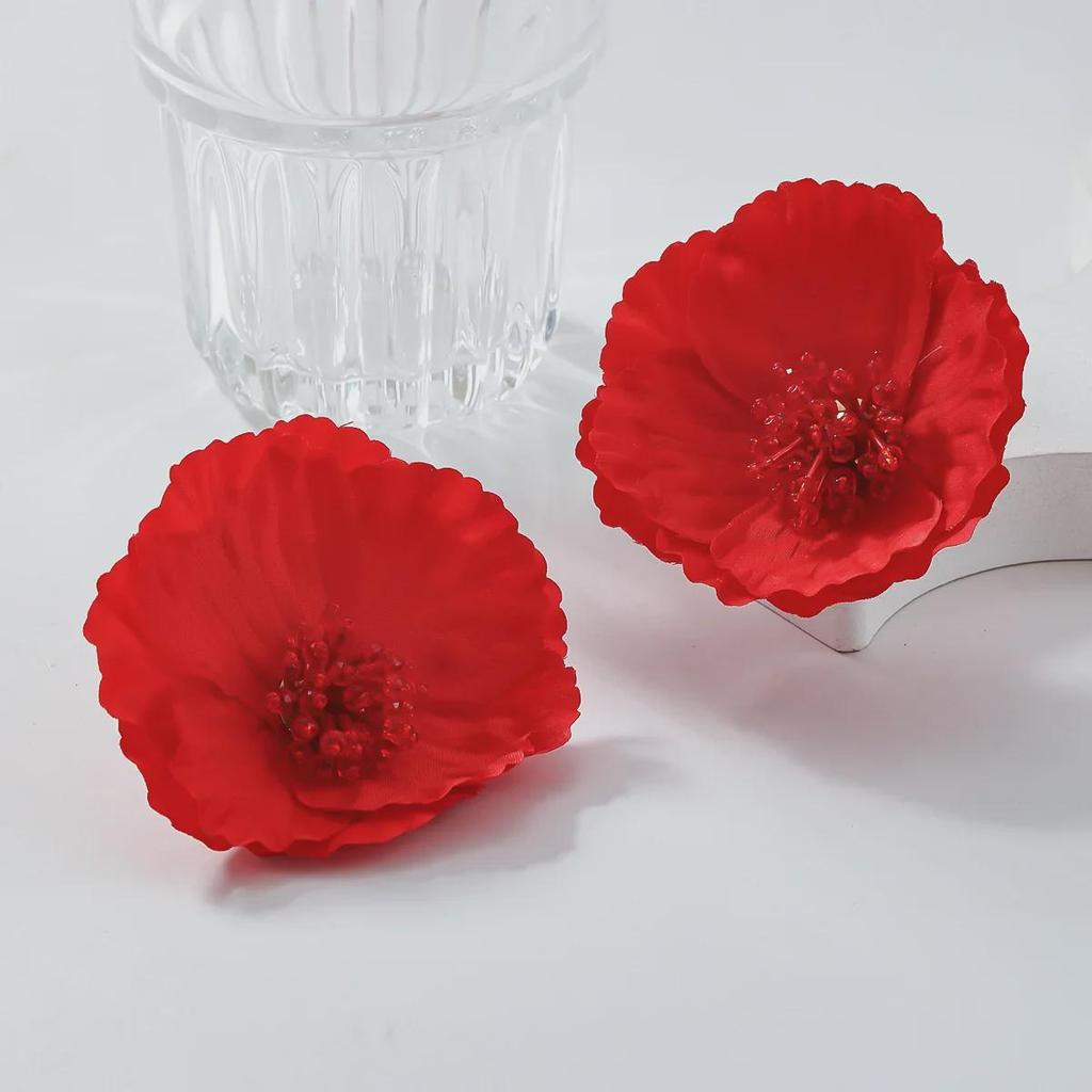 Изысканные серьги-сердечки из красного богемского хрусталя