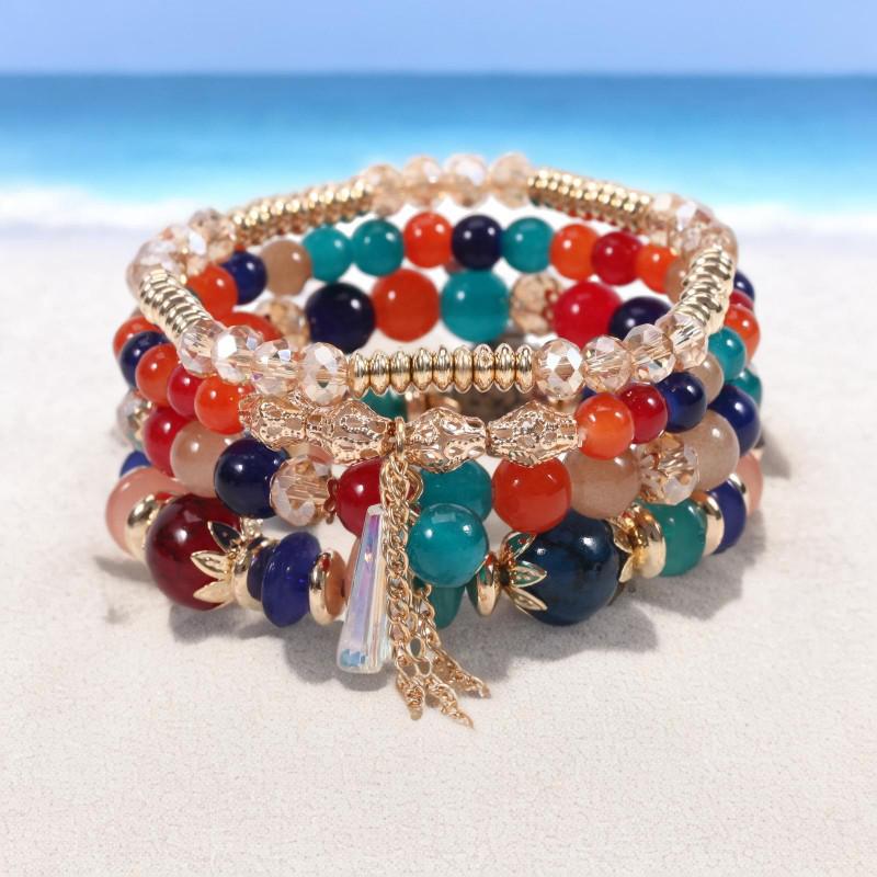 Шикарный женский браслет в стиле бохо с четырьмя слоями стеклянных бусин и кисточками