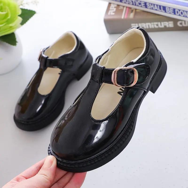 Детские кожаные туфли для школьной вечеринки, черные, белые, для девочек, модельные туфли, детские кожаные туфли на плоской подошве с Т-образным ремешком, простые, классические, с пряжкой, размеры 26-36, новые