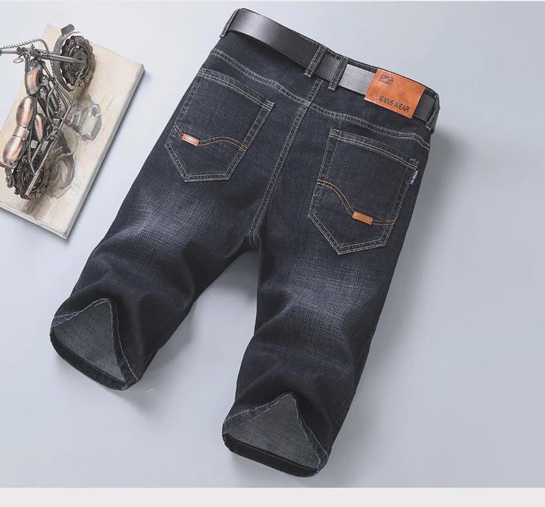 Popular Men's Cropped Four-Season Trousers: Elastic, Mid-Waist, and Trendy 7-Point Regular Denim for Youthful Style