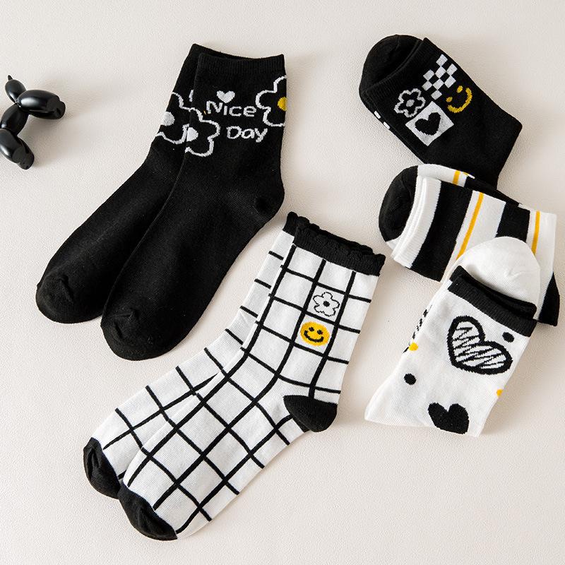BMW Trendy black and white women's new mid-calf socks, versatile heart-patterned spring and autumn long socks, wholesale from zhuji manufacturers,
