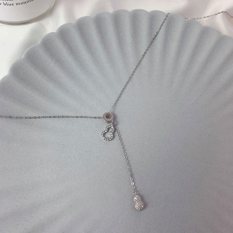 Niche Design Tassel Diamond инкрустированное ожерелье Hoist для женщин Ключичная цепочка для женщин Холодный стиль кулон тренд