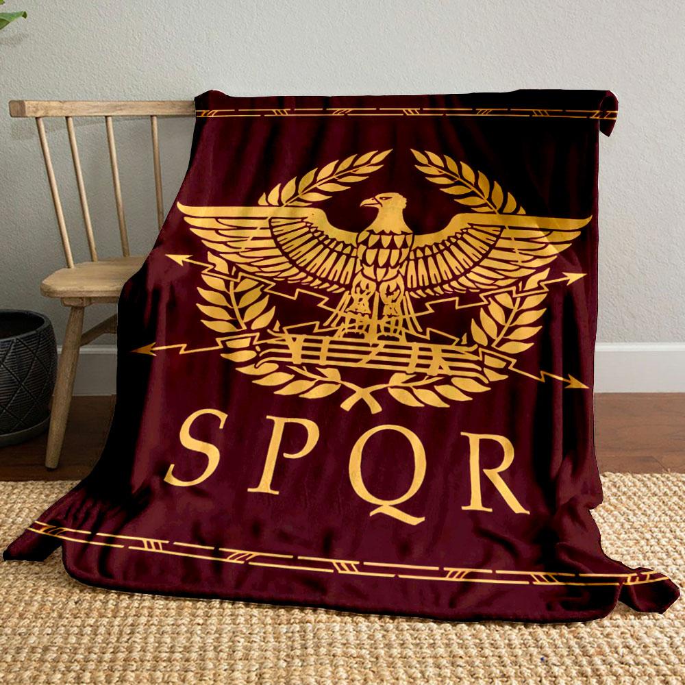 A gold eagle with spread wings, laurel wreath, SPQR inscription below. for all seasons blanket lunch break throw gift