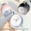 Silent Metal Alarm Clock with Night Light and Gold Stamped Spherical Face - Perfect for Students and Children.