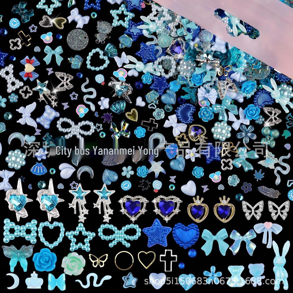 650PCS Mixed Nail Art Kit: Bows, Chrome Hearts, Pearls, Rivets, and Fairy Style Colors.