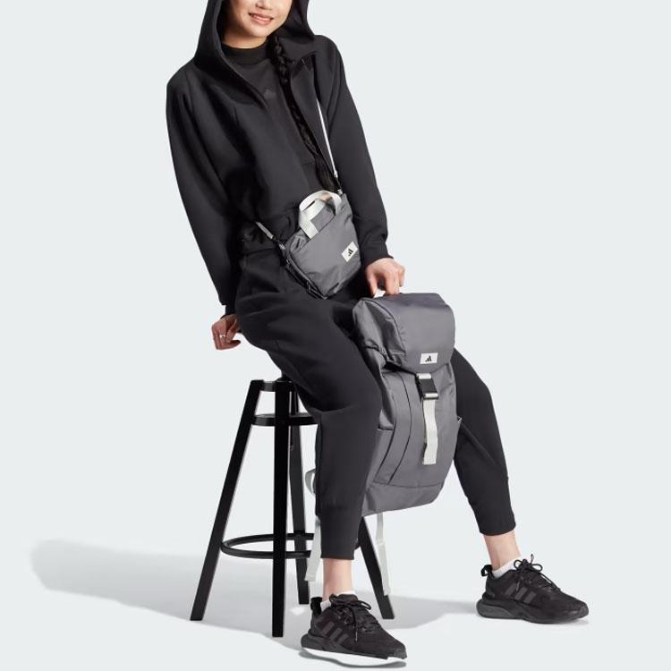 Adidas ЗНЕ. Спортивные брюки с эластичными манжетами Женские брюки черные IN5136