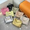 Niche Design Spring New Metal Rope Buckle Leather Woven Tote Bag Single Shoulder Portable Large Capacity Retro Women's Bag