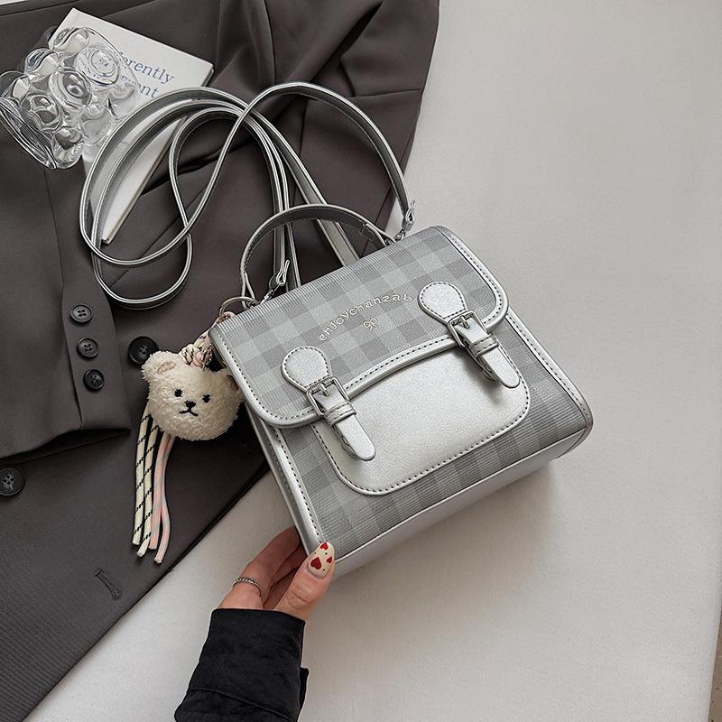 Casual plaid women's backpack 2025 summer new small backpack high value contrasting color portable small schoolbag