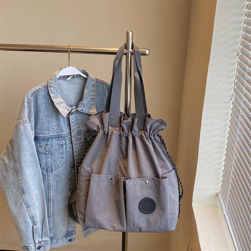 Multifunctional Travel Bag Shoulder Tote Bag Female Drawstring Backpack New Large Capacity Lightweight Waterproof Backpack