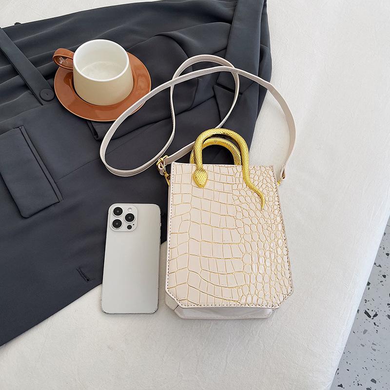 Сумки сумки женские сумки 2025 новый европейский и американский модный узор под камень персонализированная ретро глянцевая портативная сумка-мессенджер тоут