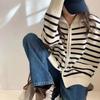 Stand-up collar design striped contrasting zipper long-sleeved knitted cardigan women's autumn and winter loose lazy wind sweater jacket tide