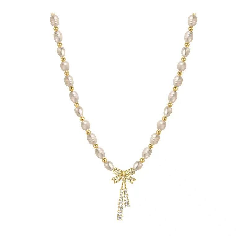 Freshwater pearl necklace slightly inlaid zircon bow French retro collarbone chain copper bead design sense necklace accessories women's accessories