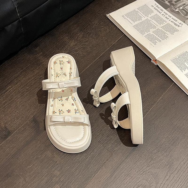 Фея стиль с юбкой женские тапочки на танкетке летние французские увеличивающие рост бант с открытым носком толстая подошва однословные крутые тапочки