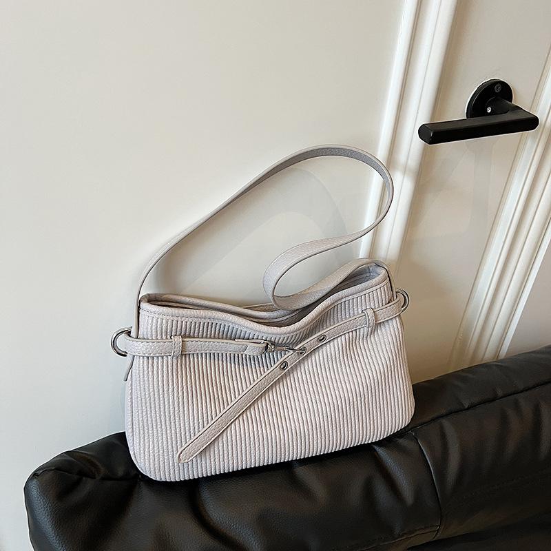 Корейская версия нишевый дизайн простая повседневная сумка через плечо женская 2025 лето новая высококачественная текстурированная сумка-мессенджер сумка-ведро