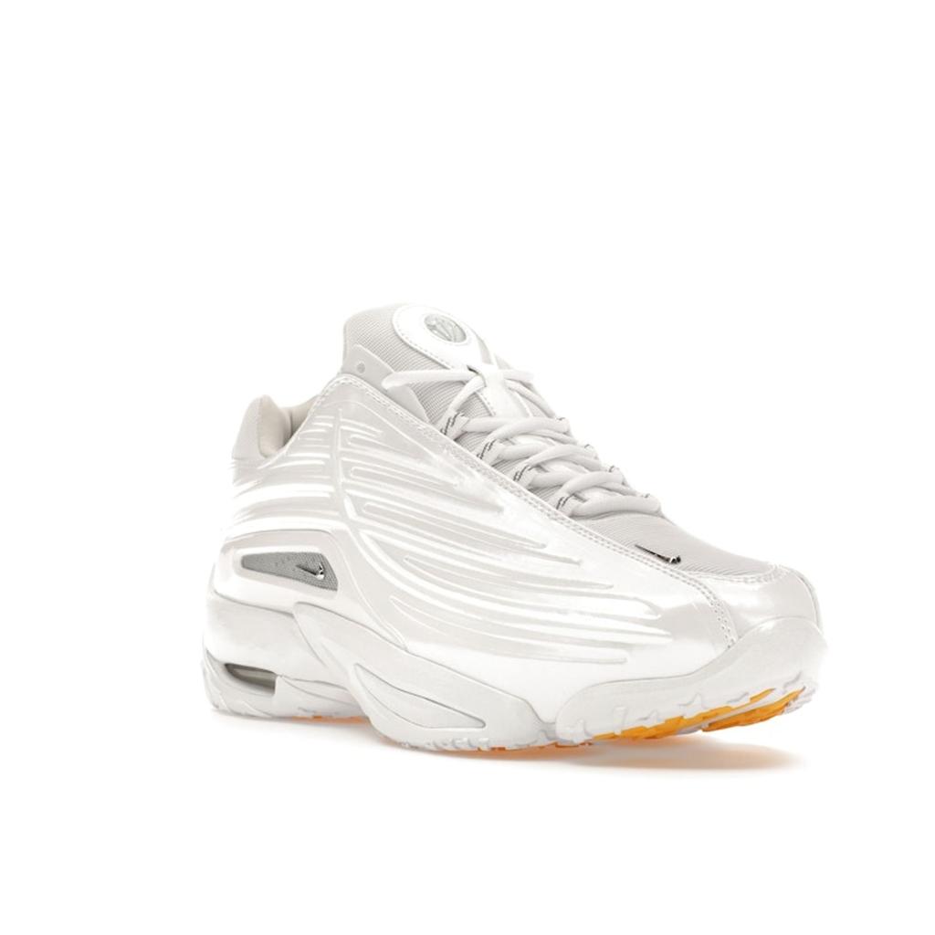 Кроссовки унисекс NOCTA x Nike Hot Step 2 белые хром университетское золото DZ7293-100