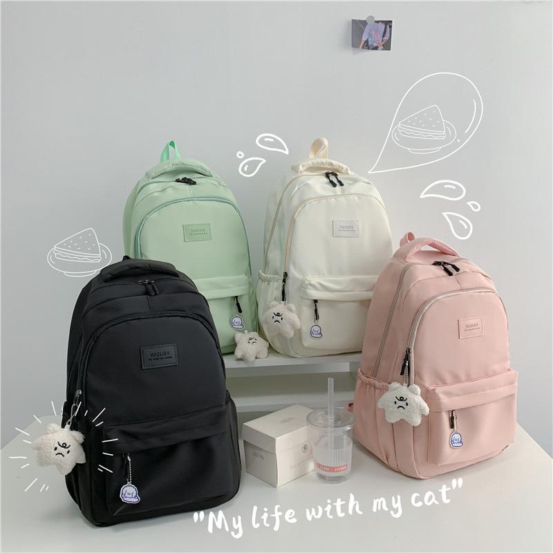 New simple solid color schoolbag simple high school student junior high school student backpack large capacity computer backpack