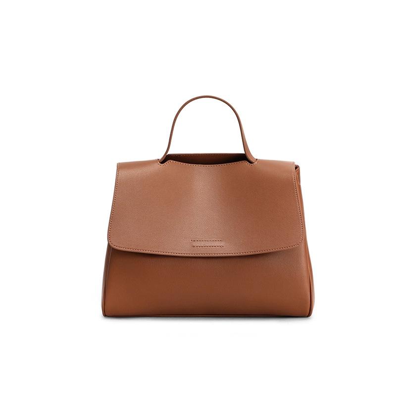 Женская сумка-тоут кроссбоди из натуральной кожи большой вместимости на весну/лето 2025