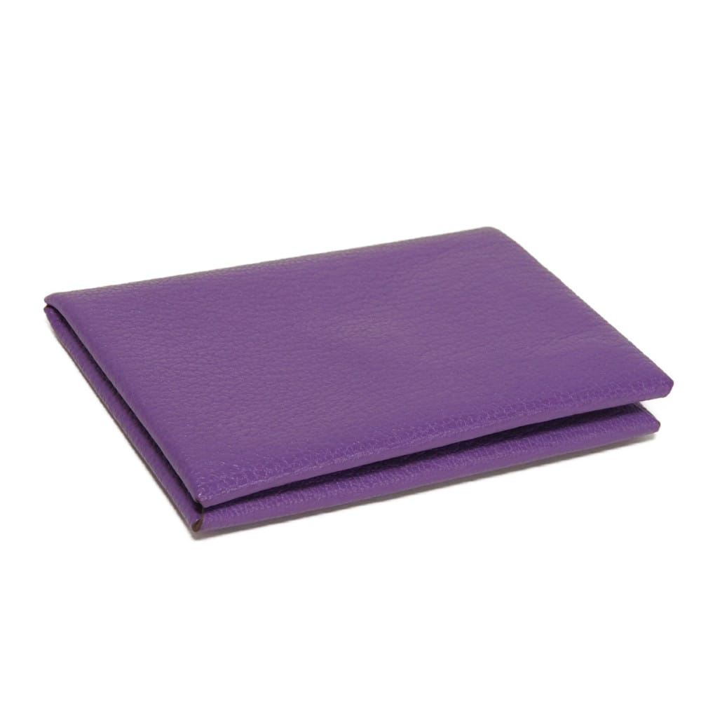Used 9212 Calvi 7946 Chevre Mysore goatskin bag with gold-stamped logo and purple snap buttons. Excellent condition.