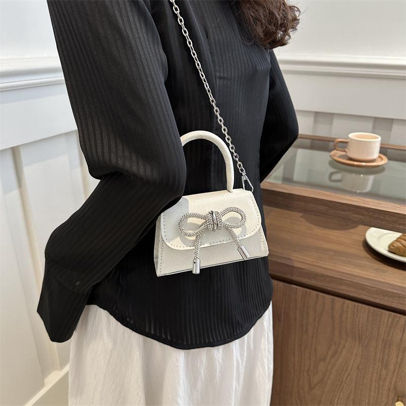 2024 весна новая модная женская сумка через плечо повседневная маленькая ароматная ветровая однотонная мини-сумочка с бантом