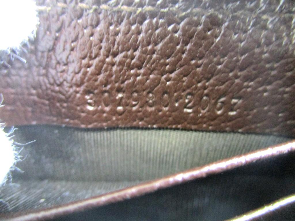 Оригинальный длинный кошелек GUCCI GG из коричневого канваса с белой кожей, на круговой молнии #a695 Открытая коробка