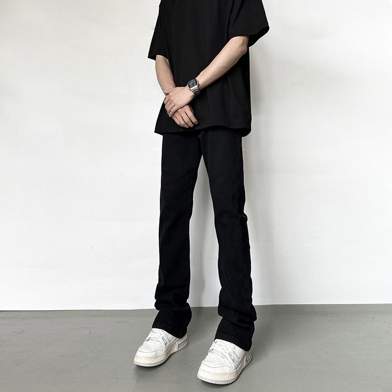 Элегантные черные расклешенные джинсы для мужчин — универсальный американский уличный стиль, стройнящий прямой крой.