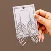 European & American Geometric Tassel Earrings - Long Leaf-Shaped Spiral Metal Design, Hollow & Exaggerated Style for Women