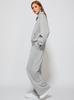 Женский oversized свитшот на молнии до середины и комплект брюк с широкими штанинами Осень/Зима 2025