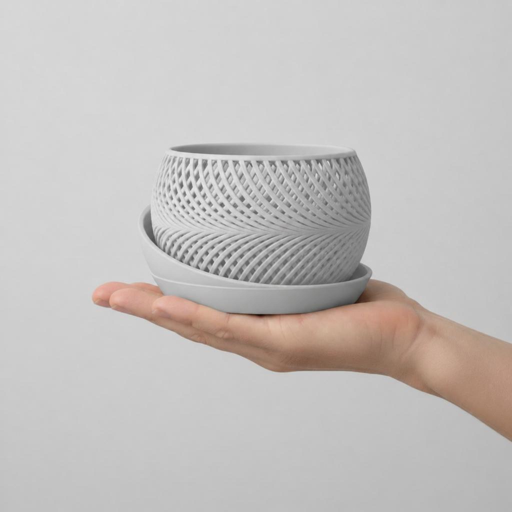 Decorative gray wicker flowerpot + plant tray