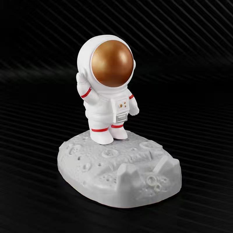 Держатель для телефона Космонавт: Креативная фигурка астронавта для украшения рабочего стола и DIY-украшения.