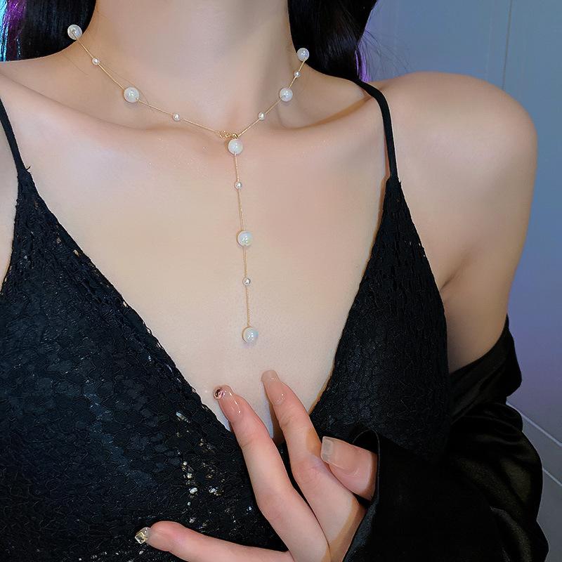 Korean temperament love butterfly pearl fringed necklace fashion collarbone chain versatile item decoration