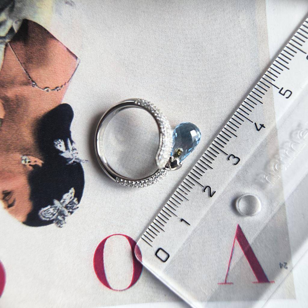 Серебряное кольцо с натуральным топазом 5.49ct, фианитами, вес изделия 3,89 гр (2206989)