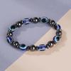 2023 Европейско-американский черный желчный камень из натурального камня, магнитный браслет для пары с синими бусинами-глазками из смолы.