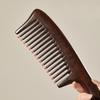 Гребень с широкими и частыми зубьями