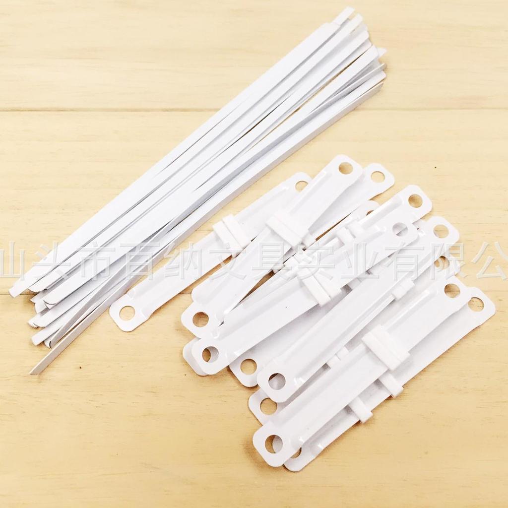 Пластиковые зажимы и двухдырочные переплетные ленты с перфоратором