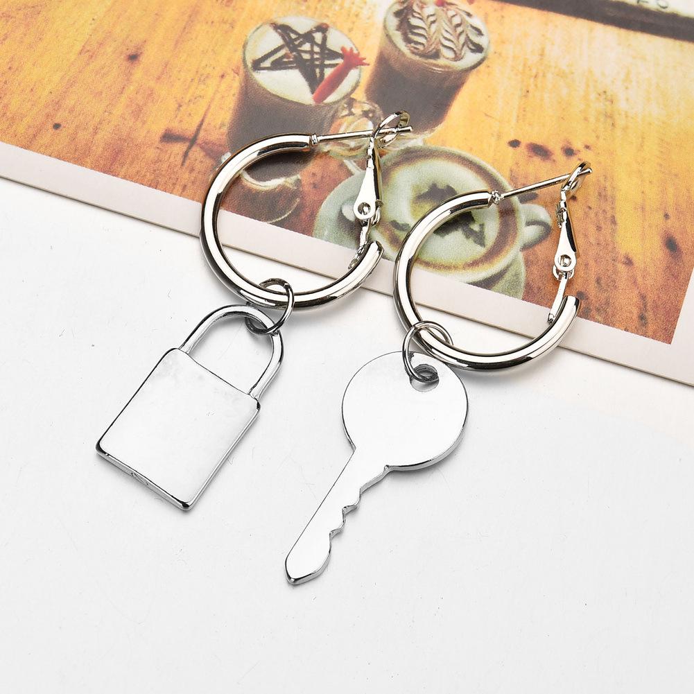 Ассимитричные серьги "ключик-замочек"