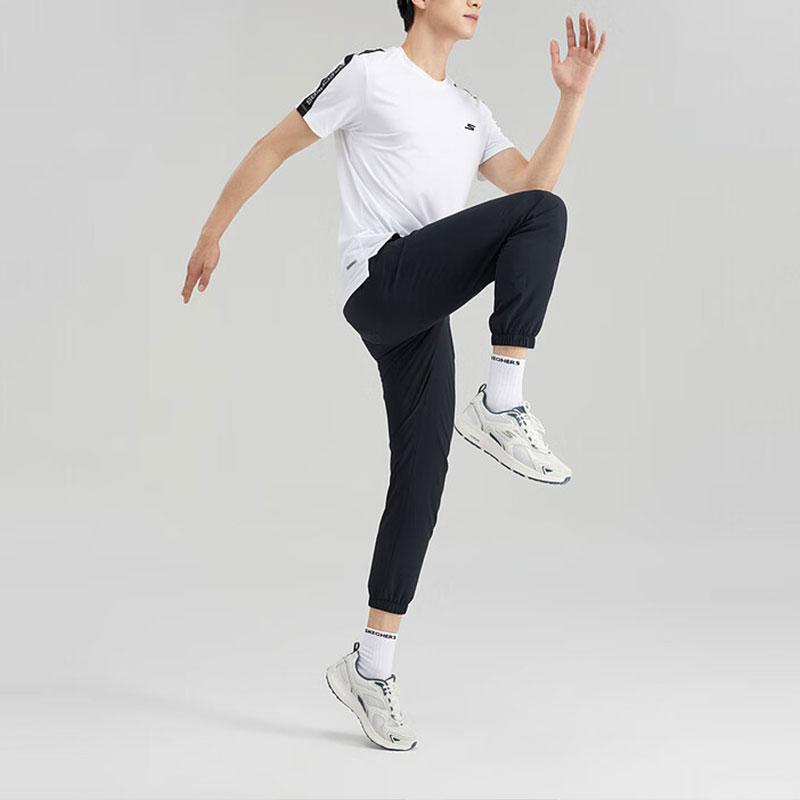 Skechers Базовая Спортивная Серия Легкие Тканые Эластичные Пояс Сужающиеся Вязаные Брюки Мужские Низ Черный Уголь P223M085-0018