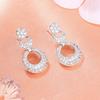 Женские круглые дизайнерские серьги Estele с родиевым покрытием и CZ