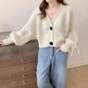 Autumn and Winter New Casual Loose V-neck Knitted Cardigan Sweater Women's Long-sleeved Bow Tether Short Top