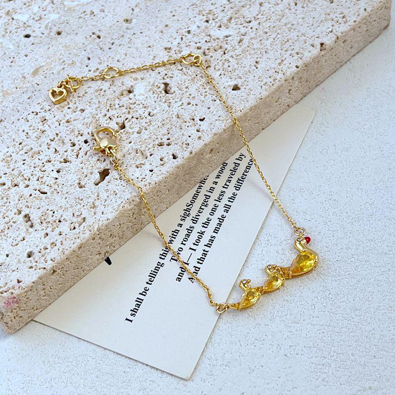 Элегантный набор ожерелья и браслета с желтым утенком, инкрустированным цирконами