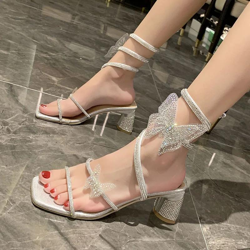 Модные женские сандалии на высоком каблуке Fairy, новинка 2024 года, летние сексуальные блестящие сандалии со стразами и змеей, тапочки, женская классная обувь