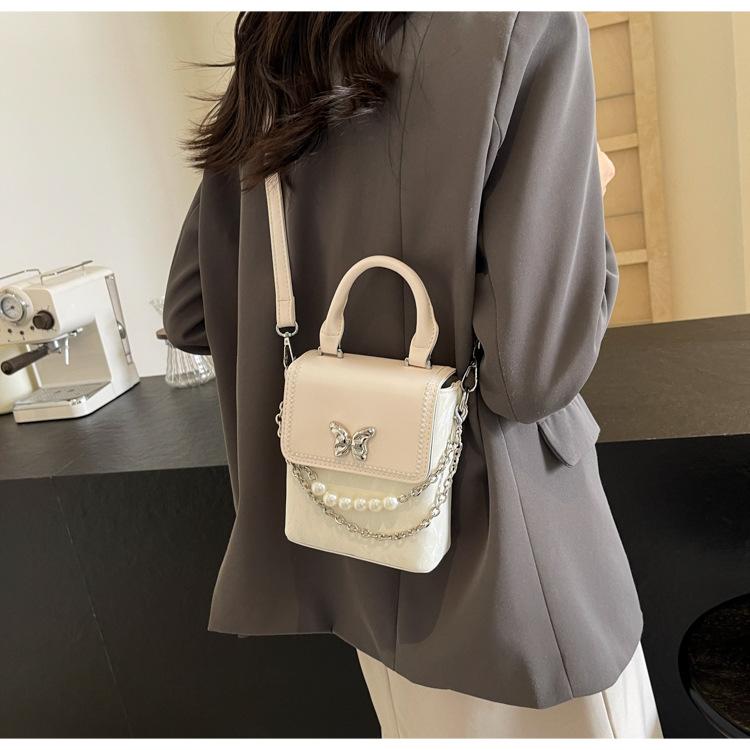 Серебряная женская сумка лето 2024 новый модный нишевый дизайн маленькая квадратная сумка интернет знаменитость бабочка сумка для мобильного телефона