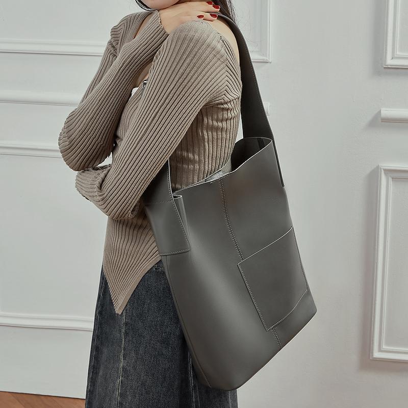 HIFASHION Женские сумки-ведра из натуральной коровьей кожи 2026 года Большая вместимость Официальные рабочие сумки через плечо Простая сумка-хобо для покупок