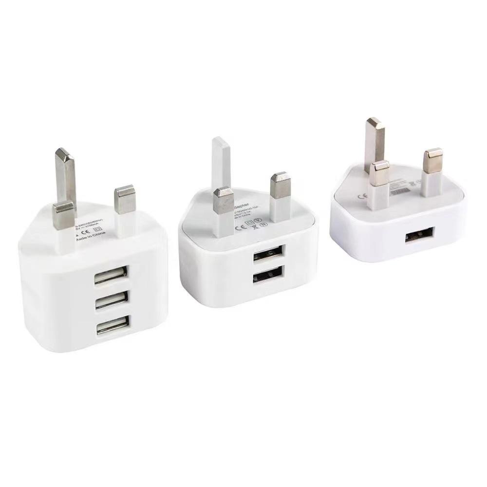 Двухпортовый USB-адаптер-зарядное устройство стандартного типа Великобритании с трехконтактной вилкой и тремя портами (Гонконгская версия) для мобильных телефонов